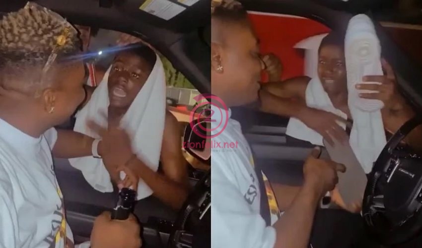 Touching Moment Rapper, AMG Armani Took Of His Sneakers And Gifted Them To A Die-hard Fan In Traffic (Video)