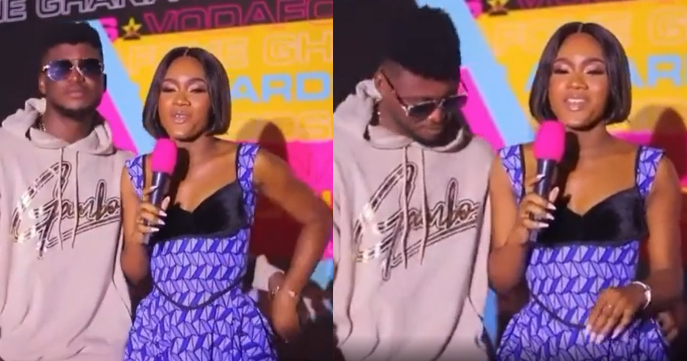 Yawa Moment VGMA Red Carpet Host, Noella Quickly Removed The Hands Of Gambo As He Tried To Grab Her By The Waist In Public – Watch Video