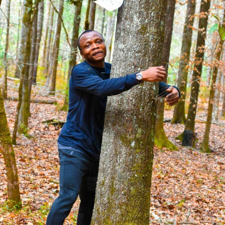 Ghanaian Activist Sets Guinness World Record By Hugging 1,123 Trees