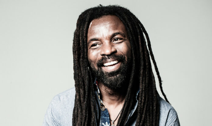 096b46_435e987a79794538934e265760fc3165~mv2_d_2143_1276_s_2 Rocky Dawuni