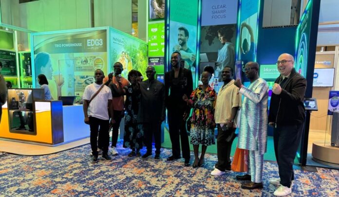 Zionfelix and Seven Other Journalists from West Africa Given a Tour of QNET Product at VCON Carnival